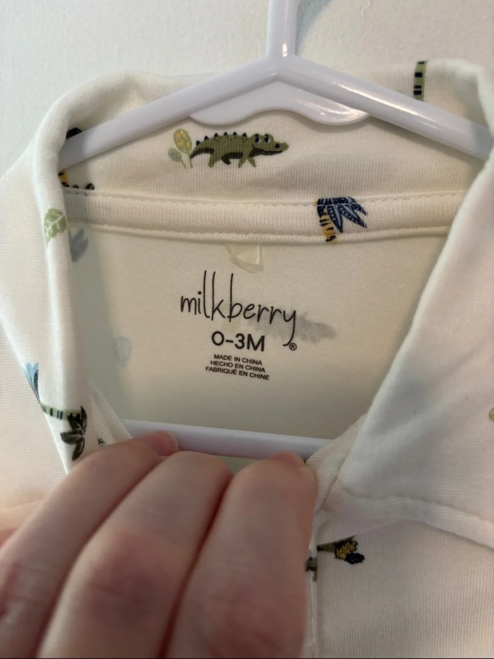 Cream Baby Polo Onesie with tropical print